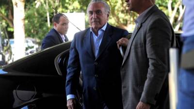 Durante la comparecencia de la presidenta Rousseff en la ONU, el gobierno recaeen manos de Temer. En la foto, el vicepresidente llegal al palacio presidenciald de Planalto, en la capiral brasileña.