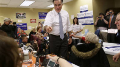 Republican presidential candidate,former Massachusetts Gov. Mitt Romney visits a campaign call center in Green Tree, Pa., Tuesday, Nov. 6, 2012. (AP Photo/Charles Dharapak)