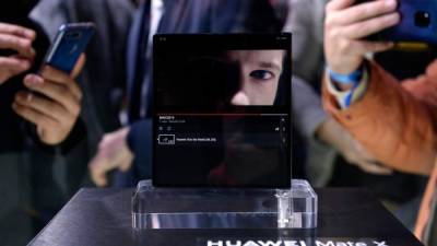 Huawei Mate X foldable smartphone is displayed at the Mobile World Congress (MWC) in Barcelona on February 28, 2019. - Phone makers will focus on foldable screens and the introduction of blazing fast 5G wireless networks at the world's biggest mobile fair as they try to reverse a decline in sales of smartphones. (Photo by Pau Barrena / AFP)