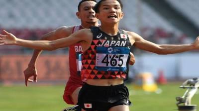 Los dos atletas terminaron con el mismo tiempo pero Inoue, favorito de la carrera, ganó por muy poco.Foto.AFP