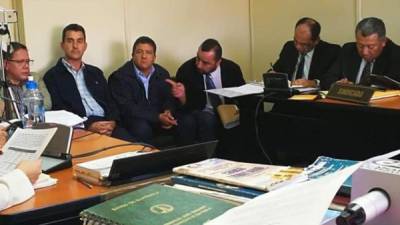 Los empresarios de Repsa durante la audiencia en la que el juez les dio a conocer los motivos de su detención. (Foto Prensa Libre: Estuardo Paredes).