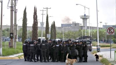 El motín dejó además 26 personas lesionadas, entre ellas dos policías y tres custodios de Cadereyta./ AFP PHOTO / Julio Cesar AGUILAR