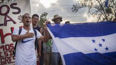 Los migrantes hondureños siguen su camino hacia Tijuana pese a las amenazas de Donald Trump. //AFP.