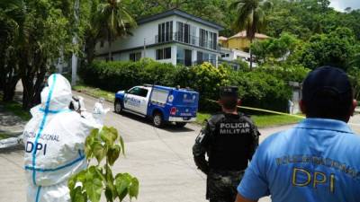 Dentro de la vivienda en que asesinaron a la familia había maletas y enseres empacados para una mudanza.