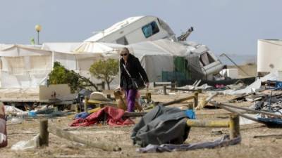 España y Portugal se recuperan hoy tras el paso del huracán Leslie, con lluvias intensas y fuertes vientos que superaron los 170 kilómetros/hora y provocaron cortes de luz y caídas de árboles.