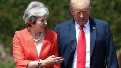 La primera ministra británica, Theresa May y el presidente de EEUU, Donald Trump. AFP