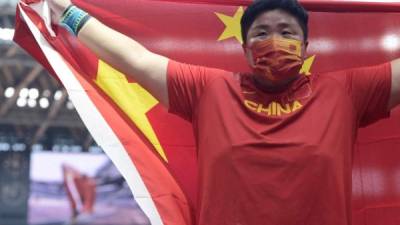 La china Gong Lijiao ganó el oro en el lanzamiento de peso femenino. Foto AFP.