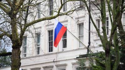The Russian flag flies from the Russian consulate in central London on March 15, 2018.Britain's Prime Minister Theresa May said Moscow was 'culpable' of the attempted murder of Skripal, a Russian spy who sold secrets to the MI6 British intelligence agency and came to Britain in a 2010 spy swap. She announced the expulsion of 23 diplomats and the suspension of some high-level contacts. / AFP PHOTO / Justin TALLIS