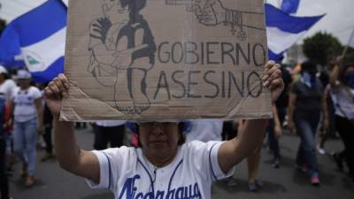 ACOMPAÑA CRÓNICA: NICARAGUA PROTESTAS - NI7007. MANAGUA (NICARAGUA), 22/07/2018.- Cientos de nicaragüenses se manifiestan hoy, domingo 22 de julio de 2018, en Managua (Nicaragua), una vez más, para demostrar que no están dispuestos a rendirse, pese al aumento de la represión y las amenazas por parte del Gobierno, y tienen más claro que nunca que la lucha por una Nicaragua pacífica y libre debe continuar en la calle. EFE/Rodrigo Sura