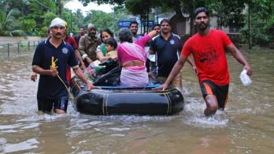 In this handout photo taken on July 23, 2021, by the Indian Navy shows areas inundated with flood water after heavy monsoon rains in Raigad district of Maharashtra (Photo by - / INDIAN NAVY / AFP) / RESTRICTED TO EDITORIAL USE - MANDATORY CREDIT  AFP PHOTO / Indian Navy - NO MARKETING - NO ADVERTISING CAMPAIGNS - DISTRIBUTED AS A SERVICE TO CLIENTS
