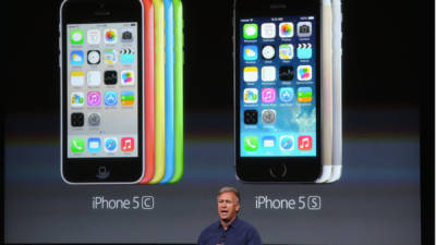 Apple CEO Tim Cook speaks on-stage during a product launch event at Apple's headquarters in Cupertino, California on September 10, 2019. - Apple unveiled its iPhone 11 models Tuesday, touting upgraded, ultra-wide cameras as it updated its popular smartphone lineup and cut its entry price to $699. (Photo by Josh Edelson / AFP)