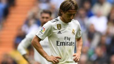 Luka Modric refleja la crisis que presente en la actualidad el Real Madrid. FOTO AFP.