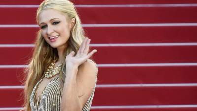 US socialite Paris Hilton attends the De Grisogono Party on the sidelines of the 68th annual Cannes Film Festival, at the Eden Roc hotel in Antibes, near Cannes, southeastern France, on May 19, 2015. AFP PHOTO / JEAN CHRISTOPHE MAGNENET (Photo credit should read JEAN CHRISTOPHE MAGNENET/AFP/Getty Images)