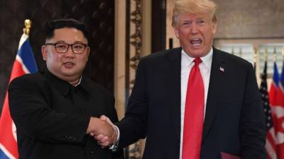 Trump y Kim firmaron en Singapur un documento que reafirma el compromiso de Corea del Norte para una 'desnuclearización completa de la península coreana'. / AFP PHOTO / SAUL LOEB