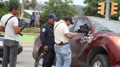 A Juan Rivera y a su hijo Luis Rivera los mataron cuando hacían el alto en el semáforo de la entrada a la colonia Los Alamos.