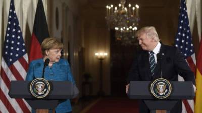 La canciller alemana Angela Merkel y el presidente de EEUU Donald Trump. AFP/Archivo