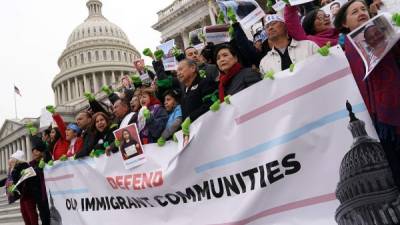 WASHINGTON, DC - DECEMBER 06: Immigration activists, including U.S. Rep. Judy Chu (D-CA) and Rep. Luis Gutierrez (D-IL), stage a protest on the steps of the U.S. Capitol December 6, 2017 in Washington, DC. Activists urged the Congress to pass a clean Dream Act and protect Temporary Protected Status (TPS) beneficiaries before the end of the year. Alex Wong/Getty Images/AFP== FOR NEWSPAPERS, INTERNET, TELCOS & TELEVISION USE ONLY ==