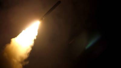 In this image released by the US Department of Defense the guided-missile cruiser USS Monterey fires a Tomahawk land attack missile on April 14, 2018. The United States, Britain and France carried out a wave of pre-dawn strikes against Syria's regime Saturday in response to a suspected chemical weapons attack, lighting up the sky of Damascus as explosions shook the city. / AFP PHOTO / US Department of Defense / Kallysta CASTILLO / RESTRICTED TO EDITORIAL USE - MANDATORY CREDIT 'AFP PHOTO / US Navy / Mass Communication Specialist 3rd Class Kallysta Castillo' - NO MARKETING NO ADVERTISING CAMPAIGNS - DISTRIBUTED AS A SERVICE TO CLIENTS