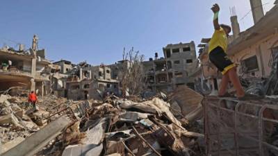 Tras el alto al fuego, los palestinos salieron de sus refugios para encontrarse con un paisaje de destrucción.