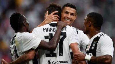 Cristiano Ronaldo se fue en blanco en su segundo partido con la camiseta de la Juve en la Serie A. FOTO AFP.