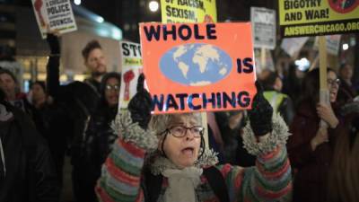 CHICAGO, IL - MARCH 07: Demonstrators march through the Loop protesting immigration and other policies instituted by the administration of President Donald Trump on March 7, 2017 in Chicago, Illinois. The demonstrators have vowed to protest in Chicago every Tuesday for the first 100 days of the Trump administration. Scott Olson/Getty Images/AFP== FOR NEWSPAPERS, INTERNET, TELCOS & TELEVISION USE ONLY ==