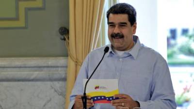 Handout picture released by the Venezuelan Presidency showing Venezuelan President Nicolas Maduro speaking during a meeting about the balance of the beginning of the 2019-2020 school year, at Miraflores Palace in Caracas, on September 23, 2019. (Photo by HO / Venezuelan Presidency / AFP) / RESTRICTED TO EDITORIAL USE - MANDATORY CREDIT 'AFP PHOTO / VENEZUELA'S PRESIDENCY / HO' - NO MARKETING - NO ADVERTISING CAMPAIGNS - DISTRIBUTED AS A SERVICE TO CLIENTS