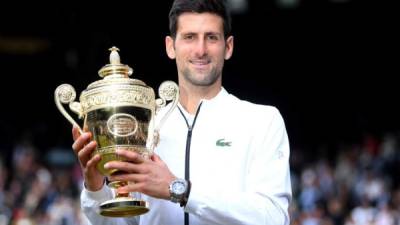 Djokovic suma ahora 16 'grandes' y Nadal tiene 18, después del duodécimo Roland Garros que ganó en junio en París. Foto AFP.