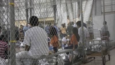 This US Customs and Border Protection photo obtained June 18, 2018 shows intake of illegal border crossers by US Border Patrol agents at the Central Processing Center in McAllen, Texas on May 23, 2018. / AFP PHOTO / US Customs and Border Protection / Handout / RESTRICTED TO EDITORIAL USE - MANDATORY CREDIT 'AFP PHOTO / US CUSTOMS AND BORDER PROTECTION/HANDOUT' - NO MARKETING NO ADVERTISING CAMPAIGNS - DISTRIBUTED AS A SERVICE TO CLIENTS