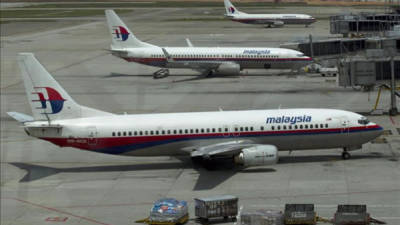 Imagen de archivo de varios aviones de Malaysian Airlines aparcados en la pista del aeropuerto internacional de Kuala Lumpur en Sepang, a las afueras de Kuala Lumpur (Malasia). EFE