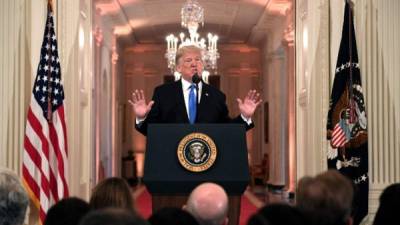 US President Donald Trump speaks during a press conference in the East Room of the White House in Washington, DC, on November 7, 2018. (Photo by Jim WATSON / AFP)
