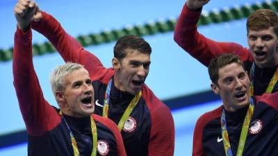 Ryan Lochte y James Feigen, ganadores de la madalla de oro en relevo junto a Michael Pehlps, afirmaron haber sido asaltados en Río el pasado domingo.