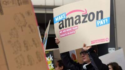 Los empleados europeos de Amazon exigen mejores condiciones laborales y un aumento de salario./AFP.