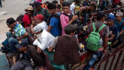 Migrantes hondureños y extranjero rumbo a EE UU.