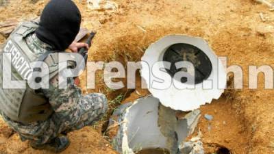 En un tanque de agua que enterraron en un terreno de las Crucitas, El Caribe, Florida, Copán, hallaron los 11 millones de dólares de los Valle.