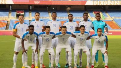 Honduras's team poses during the Tokyo 2020 Olympic Games men's group B first round football match between South Korea and Honduras at the Yokohama International Stadium in Yokohama on July 28, 2021. (Photo by Mariko ISHIZUKA / AFP)