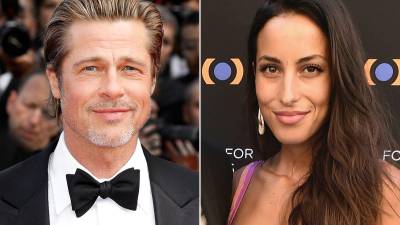 Brad Pitt e Inés De Ramón viven un tórrido romance.<b> </b>