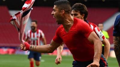 Luis Suárez le dio el triunfo al Atlético ya sobre la recta final del juego. Foto AFP.