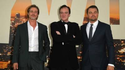El directo de 'Once Upon A Time...In Hollywood' Quentin Tarantino (c) y sus protagonistas: Brad Pitt y Leonardo DiCaprio. AFP