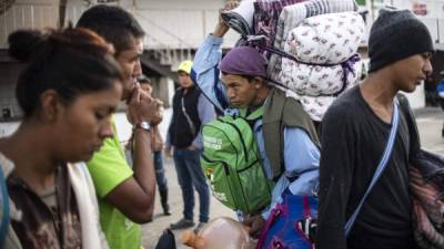 El último grupo, integrado por al menos 198 personas, que salió de El Salvador, lo hizo el pasado 18 de noviembre. AFP/Archivo