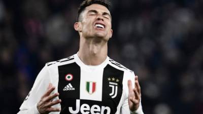 Cristiano Ronaldo metió a cuartos de final de la Champions League a la Juventus. FOTO AFP.