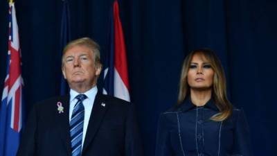 US President Donald Trump and First Lady Melania Trump arrives on September 11, 2018, to speak at the site of a new memorial in Shanksville, Pennsylvania where Flight 93 crashed during the September 11 attacks, as somber ceremonies take place at Ground Zero in New York and at the Pentagon. / AFP PHOTO / Nicholas Kamm