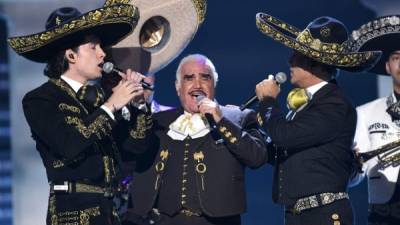 Vicente, Alejandro y Alex Fernández. Foto: AFP