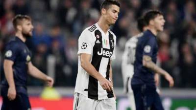 Juventus y Cristiano Ronaldo salieron decepcionados tras perder 1-2 ante Manchester United en un partido lleno de polémica. Mira las imágenes más curiosas del juego. FOTOS AFP.