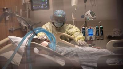 STAMFORD, CONNECTICUT - APRIL 24: (EDITORIAL USE ONLY) A nurse cleans a patient with COVID-19 on a ventilator at a Stamford Hospital Intensive Care Unit on April 24, 2020 in Stamford, Connecticut. The hospital opened additional ICUs to deal the the vast number of people suffering from the coronavirus pandemic, and roughly half of the patients at the hospital are COVID-19 positive. Stamford, with it's close proximity to New York City, has the highest number of coronavirus (COVID-19) patients in the state. John Moore/Getty Images/AFP== FOR NEWSPAPERS, INTERNET, TELCOS & TELEVISION USE ONLY ==