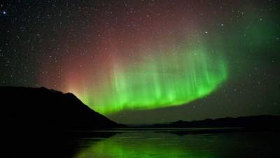 La tormenta solar causa impresionantes auroras boreales en Canadá y el norte de Estados Unidos. Foto cortesia National Geography.