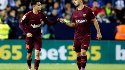 Coutinho y Luis Suárez, anotadores de los goles en La Rosaleda. FOTO EFE/Carlos Diaz.