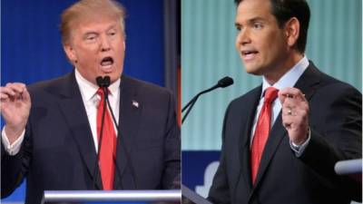 Los precandidatos Donald Trump y Marco Rubio durante el primer debate televisado del partido republicano.