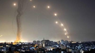 Rockets are launched towards Israel from Gaza City, controlled by the Palestinian Hamas movement, on May 11, 2021. (Photo by MAHMUD HAMS / AFP)