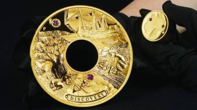 Moneda de oro, 'Discovery'. Foto.AFP
