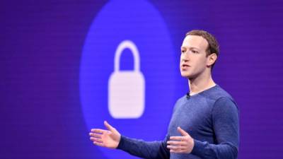 (FILES) In this file photo taken on May 1, 2018 Facebook CEO Mark Zuckerberg speaks during the annual F8 summit at the San Jose McEnery Convention Center in San Jose, California. - Facebook is shifting its focus to become 'a privacy-focused messaging and social networking platform,' chief executive Mark Zuckerberg said on March 6, 2019 in outlining a broad vision for transforming the online giant. Zuckerberg said on his Facebook page the social network will be less of 'the digital equivalent of a town square' because 'people increasingly also want to connect privately in the digital equivalent of the living room.' (Photo by JOSH EDELSON / AFP)